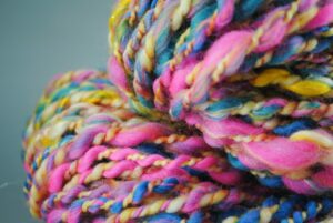 a bundle of multicolored yarn