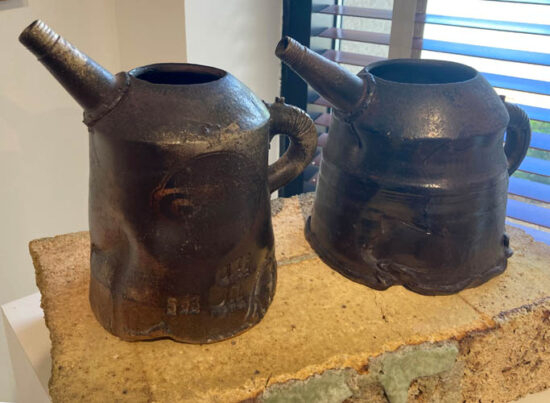 Wood-fired stoneware resembling oil gas cans