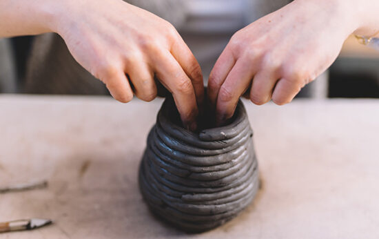 crop-hands-making-clay-pot-CeramicRotation
