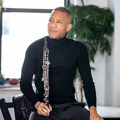 A photo of oboe player Hassan Anderson