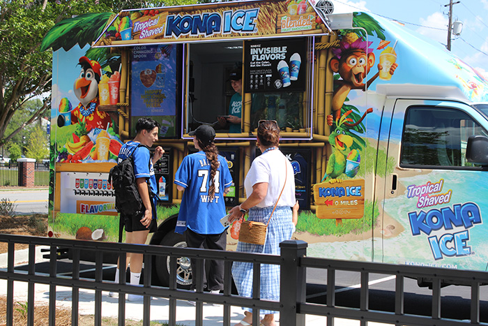 imagination station visitors enjoy cold, refreshing, and tasty Kona Ice