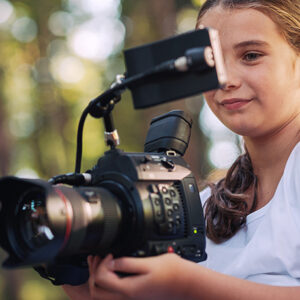 lights, camera, action - young girl taking video classes